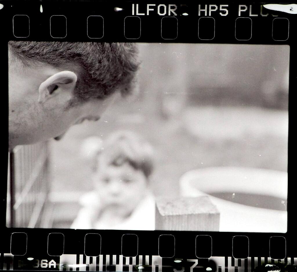 eli with ollie out of focus